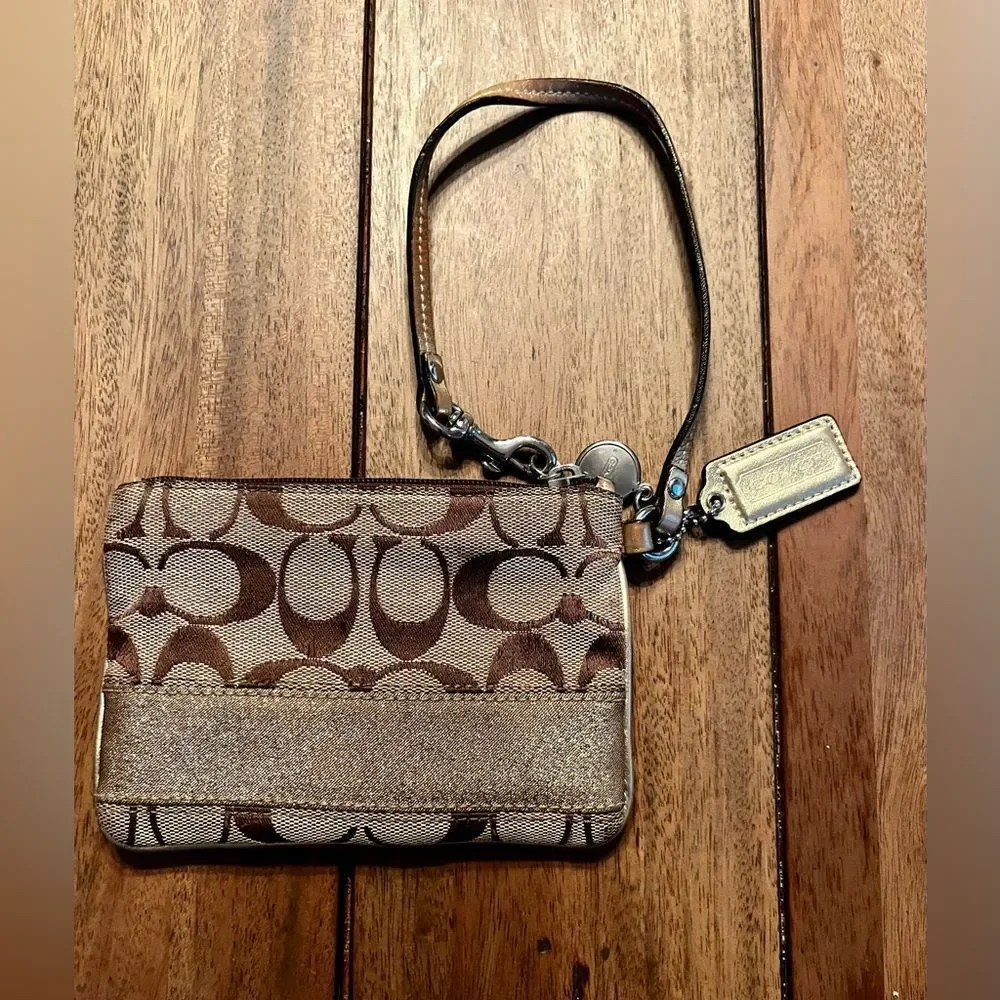 Coach Brown and Tan Signature Wristlet with gold stripe. Vintage 4x6 inches